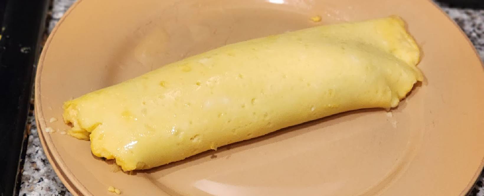 https://themamasaur.com/wp-content/uploads/2023/11/Fully-folded-French-omelette.jpg